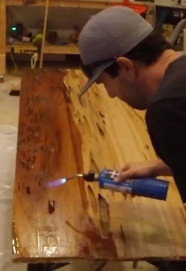 remove epoxy air pockets with torch