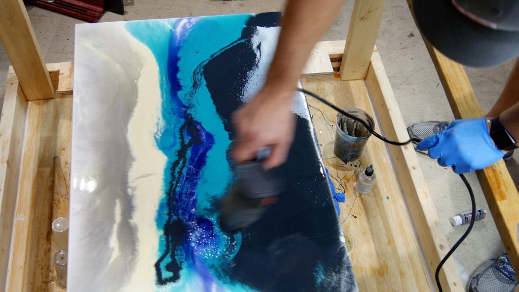 resin art effects on canvas mix colors with heat gun