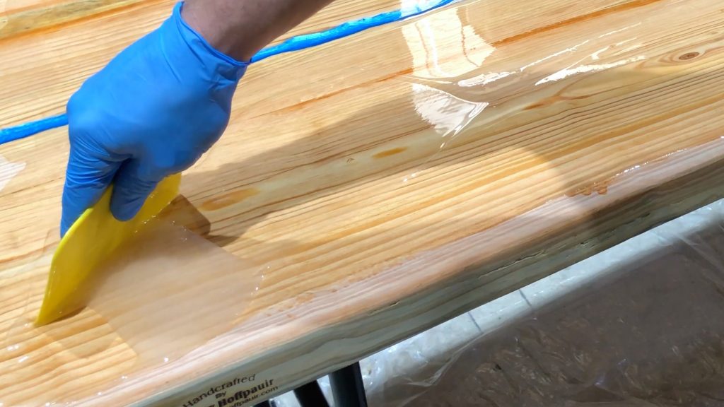 how to make a rustic table with epoxy resin - stonecoat epoxy spread
