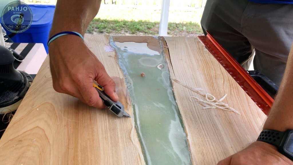 remove caulk from epoxy ocean table mould